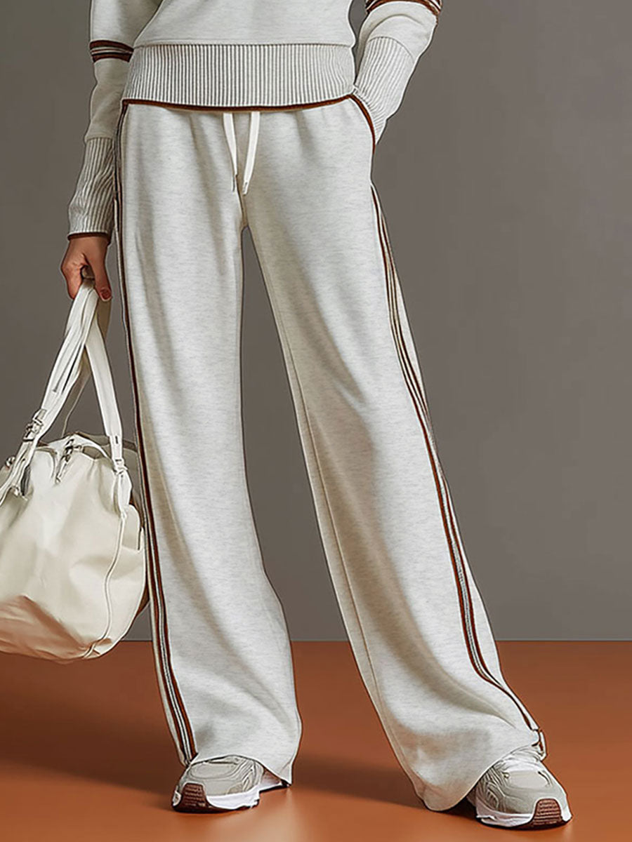 Katie – 2 Piece Track Suit with wide leg bottoms.